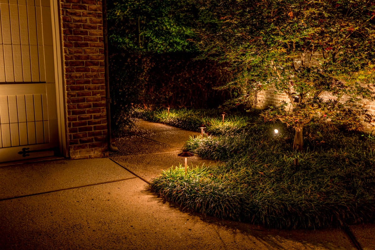 Residential Landscaping lighting side of garage walkway tree uplighting 