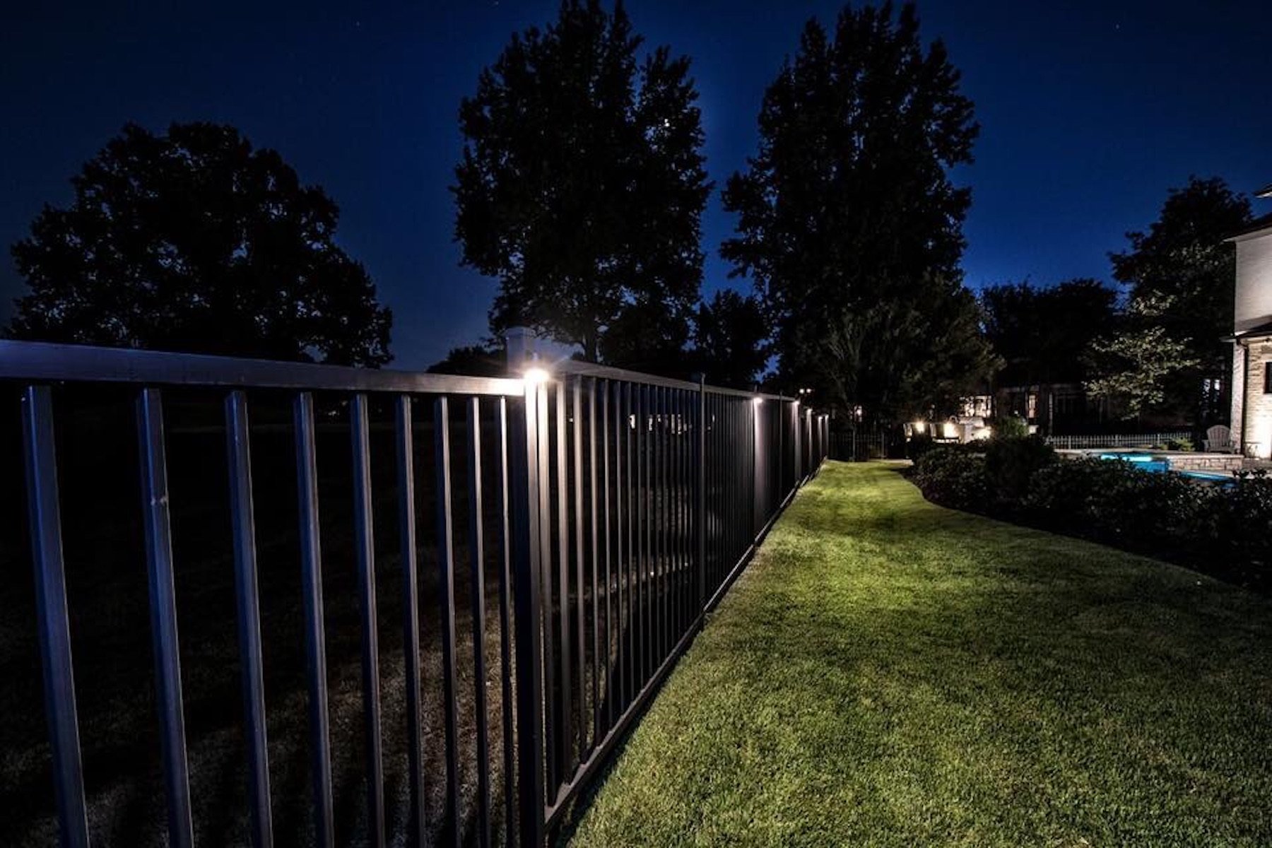 outdoor fence lighting at back of property
